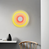 Aplique de pared redondo LED de diseño moderno multicolor para salón