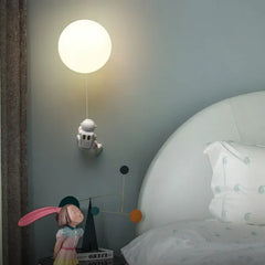 Apliques de pared dormitorio juvenil con forma de astronauta lunar
