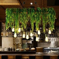 Lámparas colgantes comedor diseño con decoración de plantas