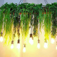 Lámparas colgantes comedor diseño con decoración de plantas