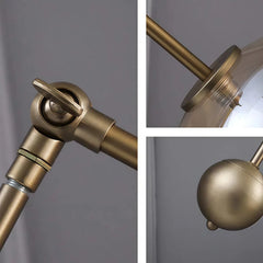 Lámpara de pie con bola de cristal articulada para salón moderno